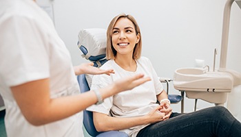 Patient smiling at cosmetic dentist in Metairie