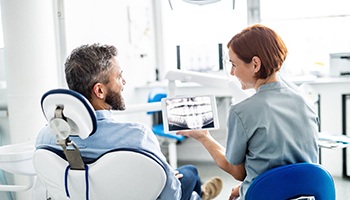 Metairie cosmetic dentist showing patient X-rays
