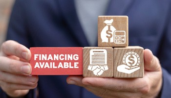 building blocks with financing-related graphics