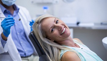 Woman smiling in dental chair