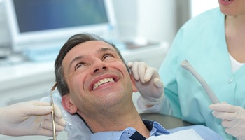 Man in dental chair for restorative treatment