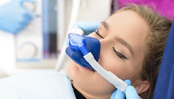Lady being sedated with nitrous oxide