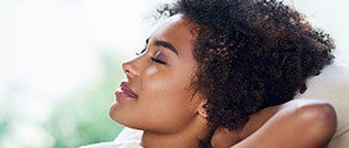 Woman laying down completely relaxed