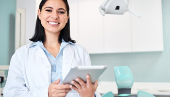 Oral surgeon smiles