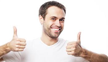 handsome man giving thumbs up