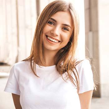 Woman after wisdom tooth extraction in Metairie