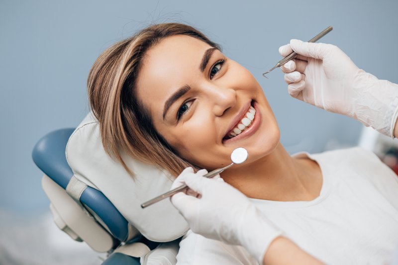 Closeup of woman smiling during dentist's appointment